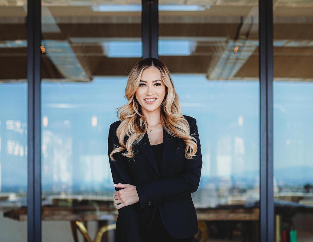 Female real estate agent portrait in modern luxury home.